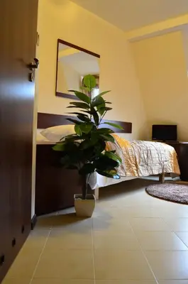 Łóżko lub łóżka w pokoju w obiekcie Camping Motel WOK