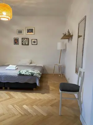 Łóżko lub łóżka w pokoju w obiekcie Slow Life Apartment next to Metro Station