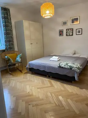 Łóżko lub łóżka w pokoju w obiekcie Slow Life Apartment next to Metro Station