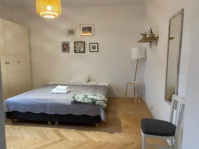 Łóżko lub łóżka w pokoju w obiekcie Slow Life Apartment next to Metro Station
