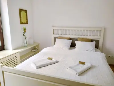 Łóżko lub łóżka w pokoju w obiekcie Warsaw Concierge Vistula Apartment