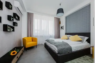 Łóżko lub łóżka w pokoju w obiekcie ShortStayPoland Aleje Jerozolimskie (B59)