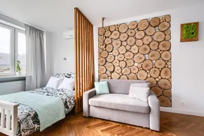 Łóżko lub łóżka w pokoju w obiekcie Central Station Apartment - Wilcza