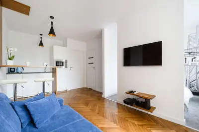 Telewizja i/lub zestaw kina domowego w obiekcie Central Station Apartment - Wilcza