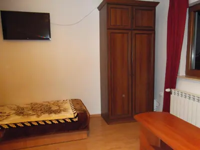 Telewizja i/lub zestaw kina domowego w obiekcie Dworek w Zieleni