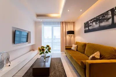 Telewizja i/lub zestaw kina domowego w obiekcie Platinum Towers E-Apartments