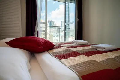 Łóżko lub łóżka w pokoju w obiekcie Platinum Towers E-Apartments