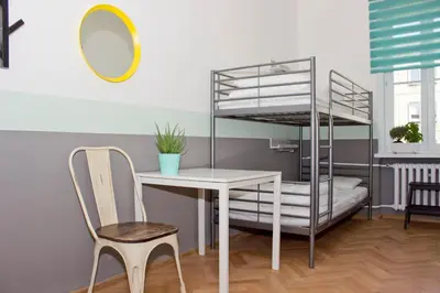 Łóżko lub łóżka w pokoju w obiekcie Chillout Hostel