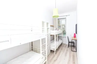 Łóżko lub łóżka w pokoju w obiekcie Chillout Hostel