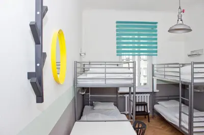 Łóżko lub łóżka w pokoju w obiekcie Chillout Hostel