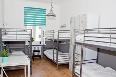 Łóżko lub łóżka w pokoju w obiekcie Chillout Hostel