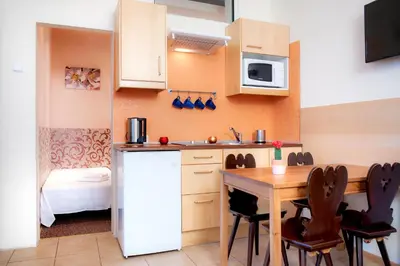 Kuchnia lub aneks kuchenny w obiekcie Apartamenty Dobranoc - Wawer