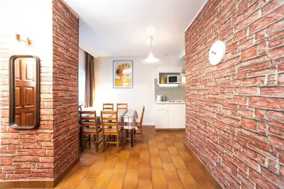 Kuchnia lub aneks kuchenny w obiekcie Apartamenty Dobranoc - Wawer