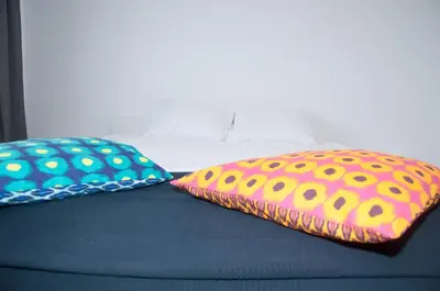 Łóżko lub łóżka w pokoju w obiekcie Apartament Business Magazynowa 11A