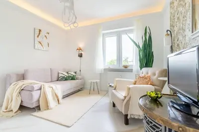 Telewizja i/lub zestaw kina domowego w obiekcie Plac Inwalidów 10 - Aesthetic Apartment by Noclegi Renters