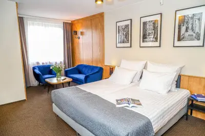 Łóżko lub łóżka w pokoju w obiekcie Warsaw Apartments - Apartamenty Sadyba