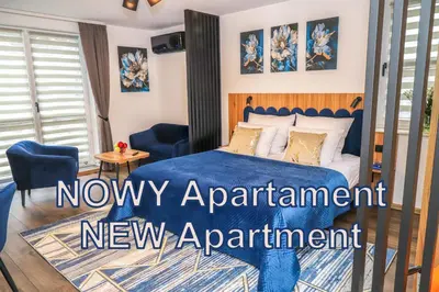 Łóżko lub łóżka w pokoju w obiekcie Warsaw Apartments - Apartamenty Sadyba