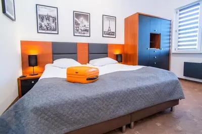 Łóżko lub łóżka w pokoju w obiekcie Warsaw Apartments - Apartamenty Sadyba