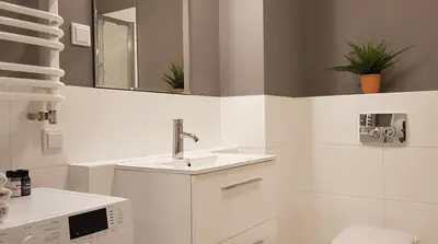 Łazienka w obiekcie City Apartments Centrum