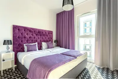 Łóżko lub łóżka w pokoju w obiekcie Apartamenty Vola Residence