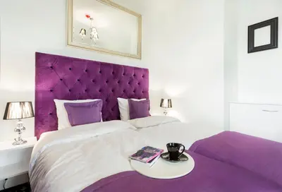 Łóżko lub łóżka w pokoju w obiekcie Apartamenty Vola Residence