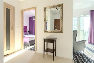 Łóżko lub łóżka w pokoju w obiekcie Apartamenty Vola Residence
