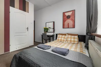 Łóżko lub łóżka w pokoju w obiekcie Hostel Coco