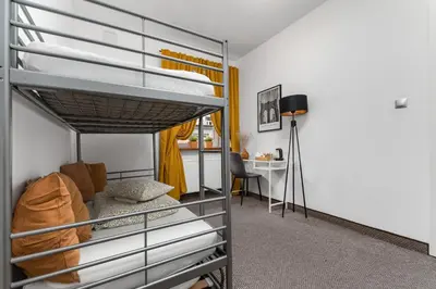Łóżko lub łóżka w pokoju w obiekcie Hostel Coco
