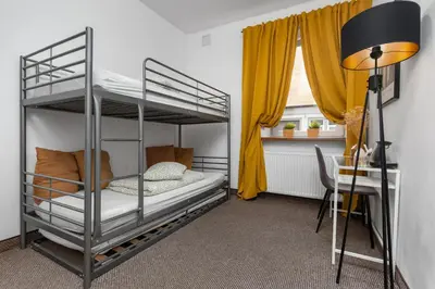Łóżko lub łóżka w pokoju w obiekcie Hostel Coco