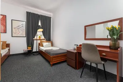 Łóżko lub łóżka w pokoju w obiekcie Hostel Coco