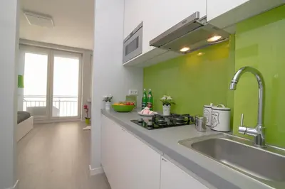Kuchnia lub aneks kuchenny w obiekcie WLR Apartments - Marszalkowska