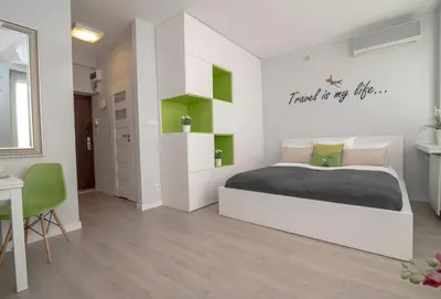 Łóżko lub łóżka w pokoju w obiekcie WLR Apartments - Marszalkowska