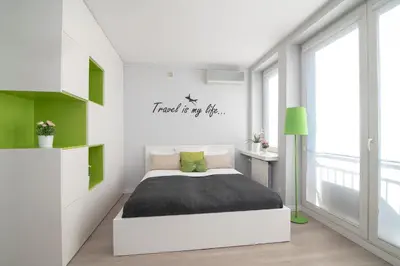 Łóżko lub łóżka w pokoju w obiekcie WLR Apartments - Marszalkowska