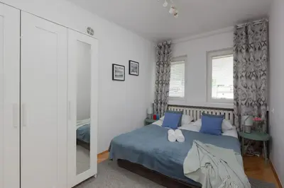 Łóżko lub łóżka w pokoju w obiekcie Stars Apartament City Center by Noclegi Renters