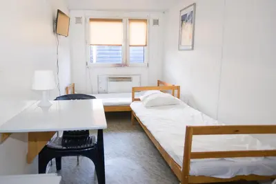 Łóżko lub łóżka w pokoju w obiekcie Hostel Metro