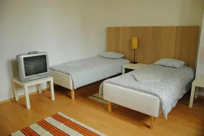 Łóżko lub łóżka w pokoju w obiekcie Central Station Hostel
