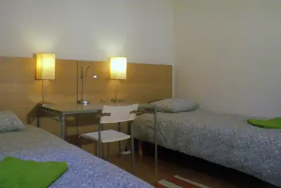 Łóżko lub łóżka w pokoju w obiekcie Central Station Hostel