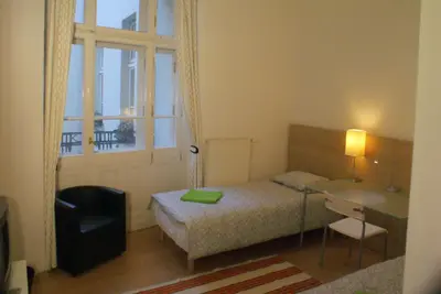 Łóżko lub łóżka w pokoju w obiekcie Central Station Hostel