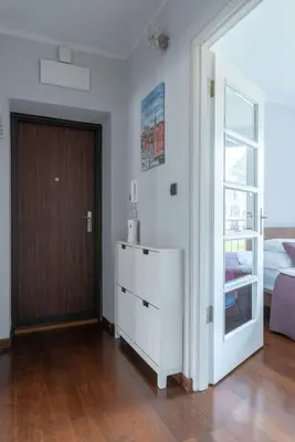 Łóżko lub łóżka w pokoju w obiekcie City Center Boutique Apartment