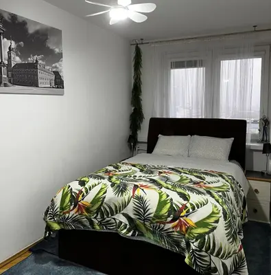 Łóżko lub łóżka w pokoju w obiekcie DELUXE WIDOK 24 APARTMENT