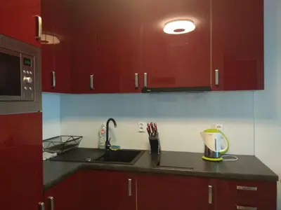 Kuchnia lub aneks kuchenny w obiekcie CHERRY APARTAMENT W ŚCISŁYM CENTRUM