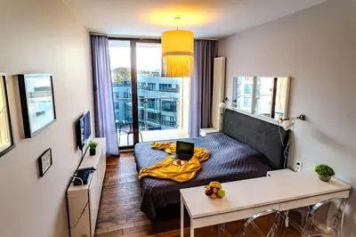 Telewizja i/lub zestaw kina domowego w obiekcie Apartamenty Triton Park
