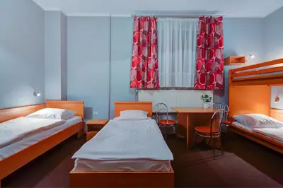 Łóżko lub łóżka w pokoju w obiekcie Hostel Evotel