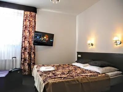 Łóżko lub łóżka w pokoju w obiekcie Hostel Evotel