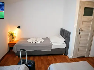 Łóżko lub łóżka w pokoju w obiekcie Hostel Evotel