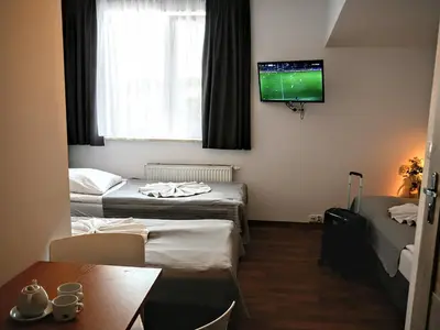 Łóżko lub łóżka w pokoju w obiekcie Hostel Evotel