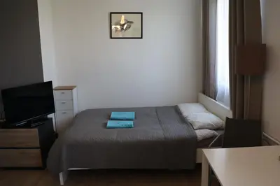 Łóżko lub łóżka w pokoju w obiekcie Waw Studio