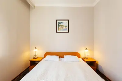 Łóżko lub łóżka w pokoju w obiekcie Noclegi Stadion Bed & Breakfast