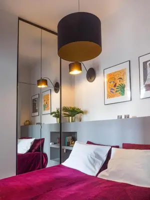 Łóżko lub łóżka w pokoju w obiekcie Aparthotel Nowy Świat 28