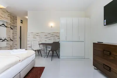 Łóżko lub łóżka w pokoju w obiekcie Apartamenty Dom Saski 10 minut od Centrum Warszawy